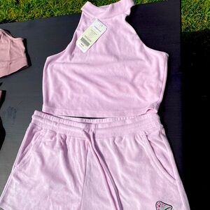 Fabletics Terry cloth racer back mock neck crop top with matching shorts.